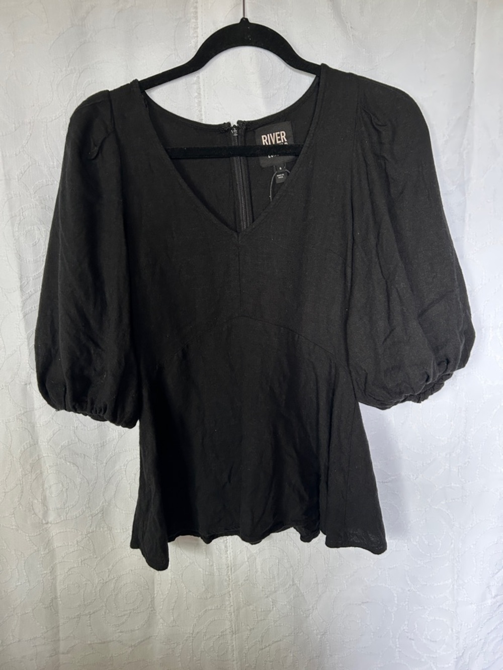 RIVER ISLAND LONDON Black Puff Sleeve V-Neck Top. Size 8. Flairs at bottom.